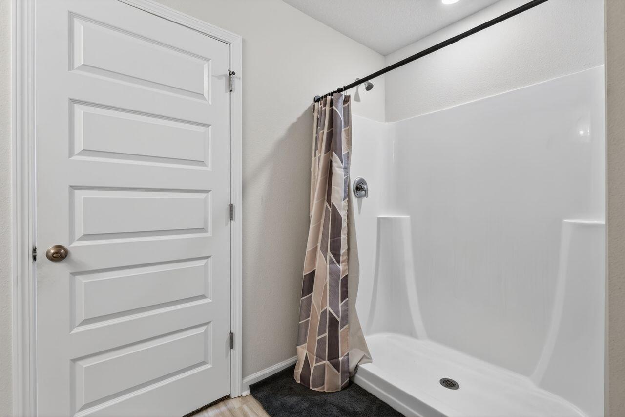 2637 Saltgrass Way Crestview, FL 32536 - Photo 30 of 47 a bathroom with a shower