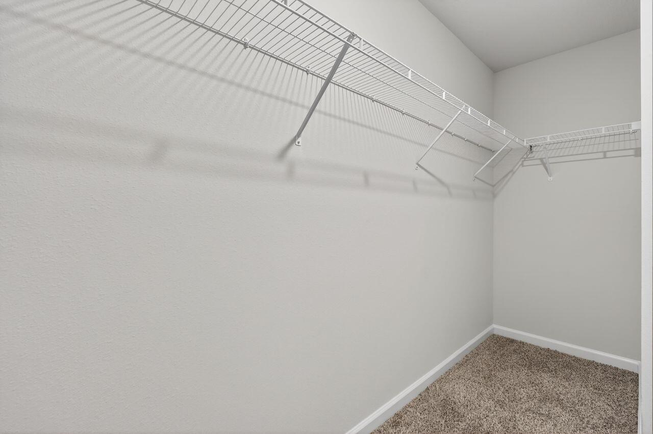 2637 Saltgrass Way Crestview, FL 32536 - Photo 35 of 47 a view of a room with racks on the wall