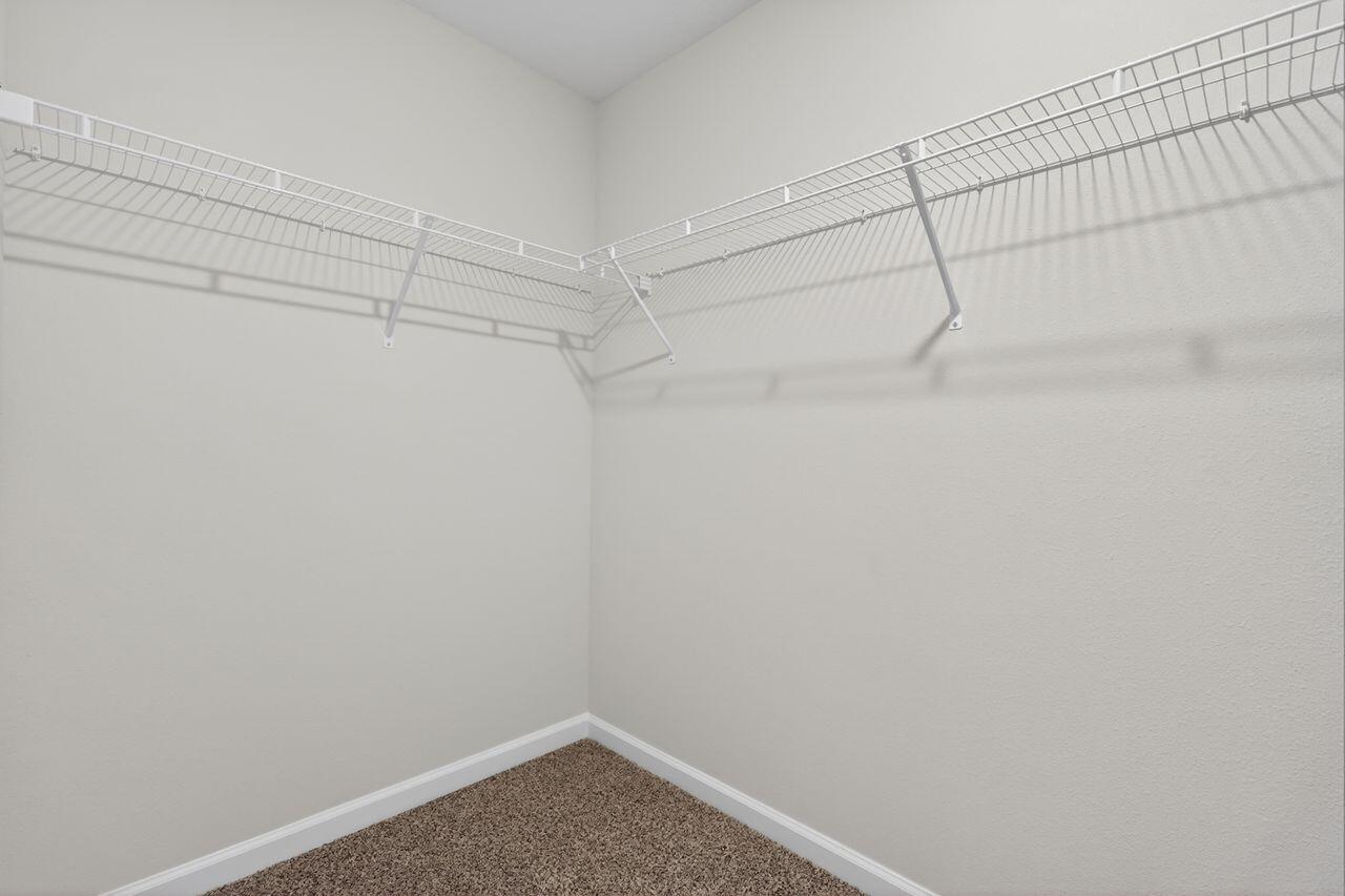 2637 Saltgrass Way Crestview, FL 32536 - Photo 36 of 47 a view of a room with racks on the wall