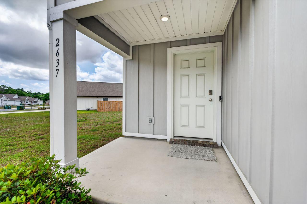 2637 Saltgrass Way Crestview, FL 32536 - Photo 5 of 47 a view of a front door