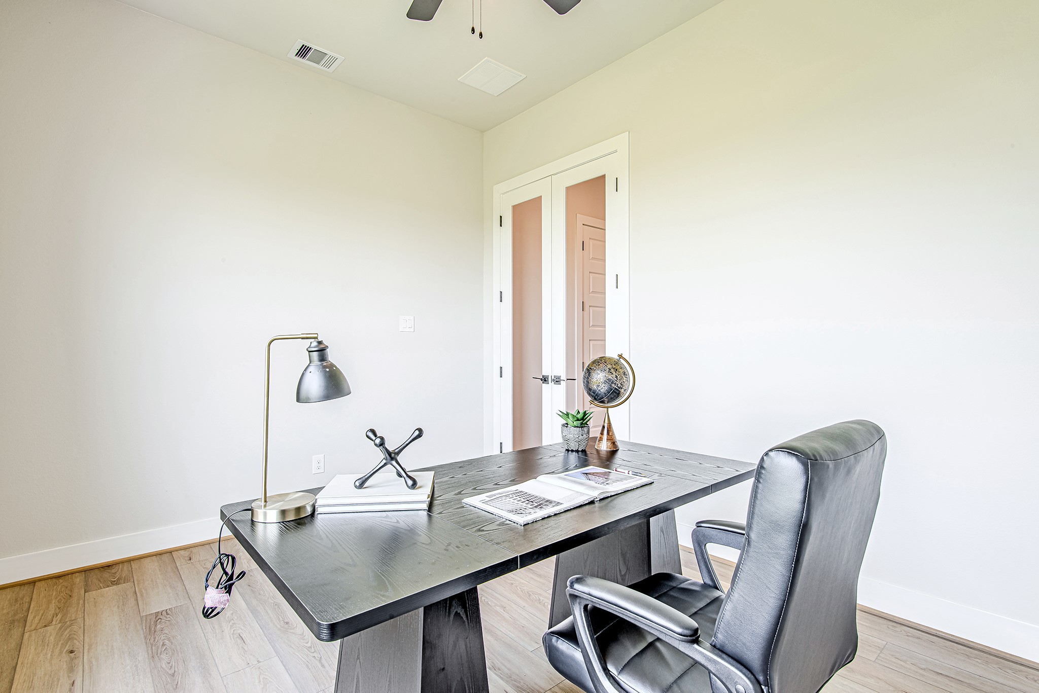 141 Peninsula Point Drive Montgomery, TX 77356 - Photo 28 of 47 This private home office features French doors and clean, minimalist lines—offering a quiet retreat for focus and productivity.