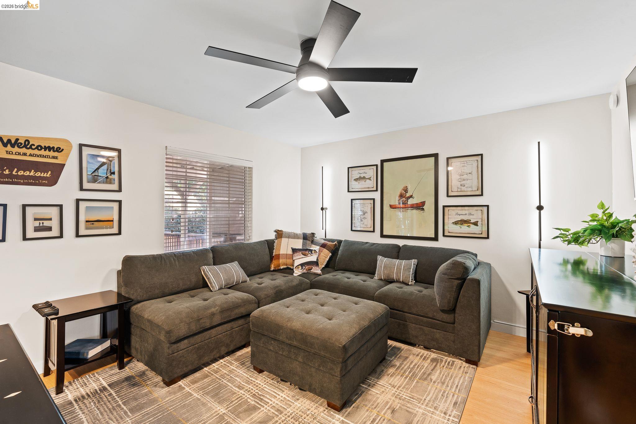 1704 Taylor Road Bethel Island, CA 94511 - Photo 8 of 73 Interior living space featuring light wood-finish flooring and a contemporary ceiling fan