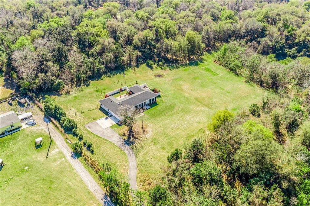 Peace, quiet and nature abound, don't miss your chance to own this custom DREAM HOME on 6 ACRES of Land!