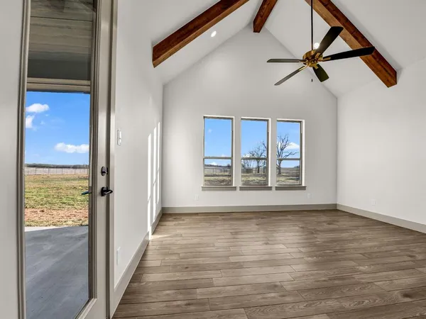 a view of an empty room and window