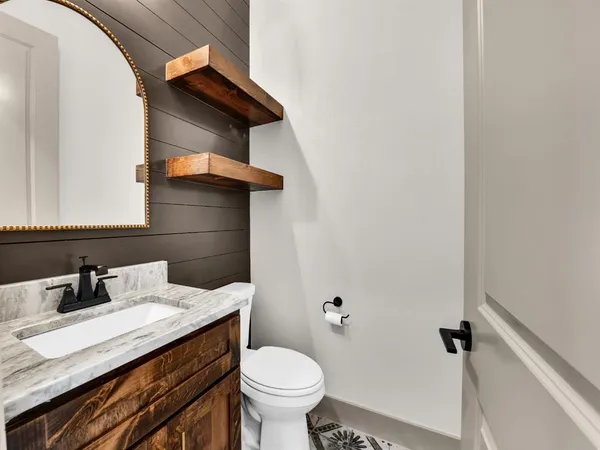 a bathroom with a sink and a toilet