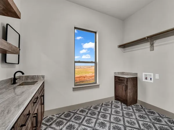 a room that has a bed and a window in it