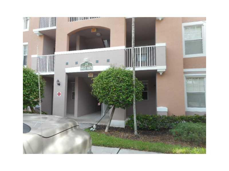 6656 West Sample Road, Unit 6656 Coral Springs, FL 33067 - Photo 2 of 12 Exterior Front