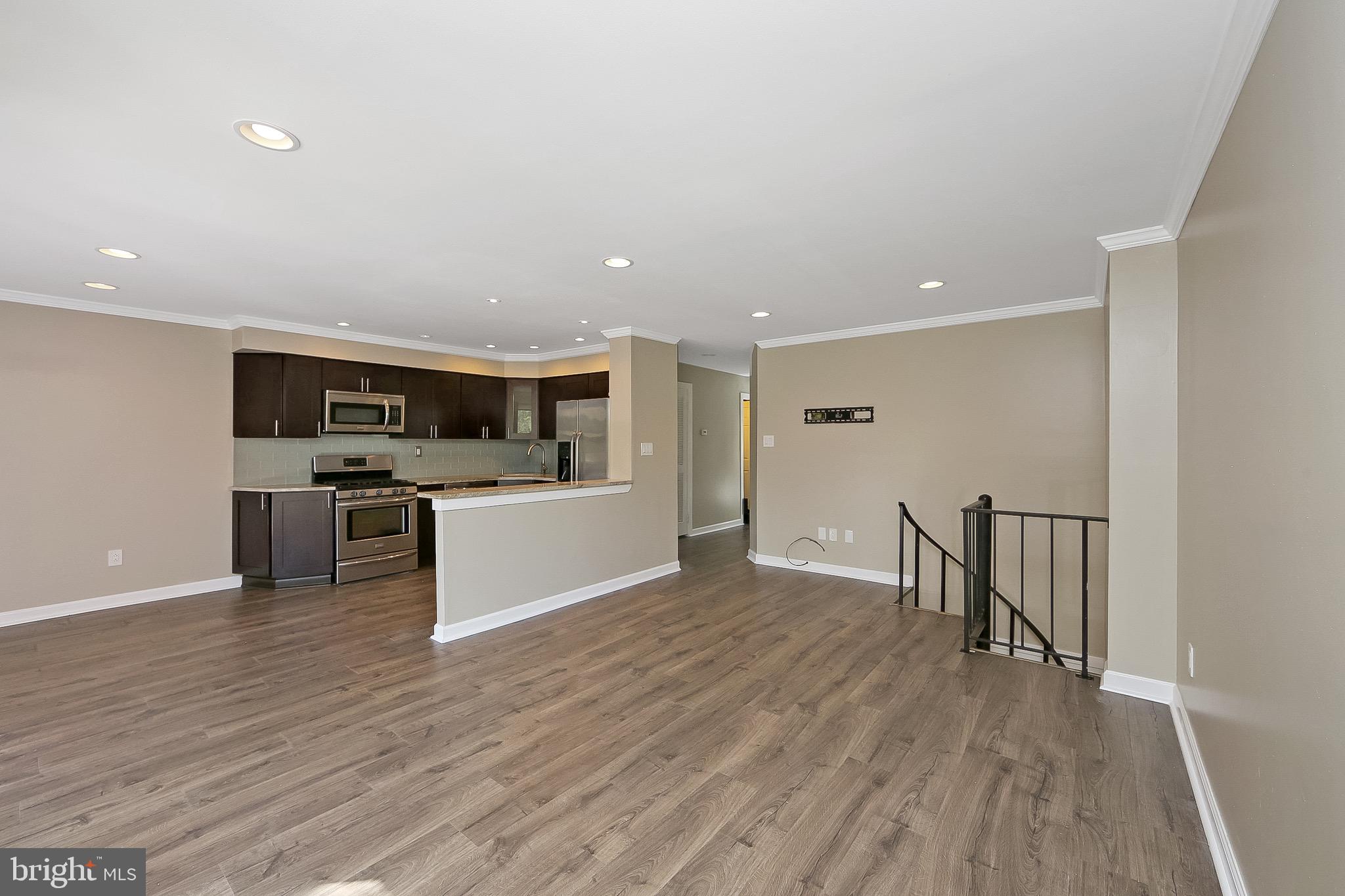 9558 State Rd., Unit 47A Philadelphia, PA 19114 - Photo 6 of 38 Main Floor Living Room/Kitchen