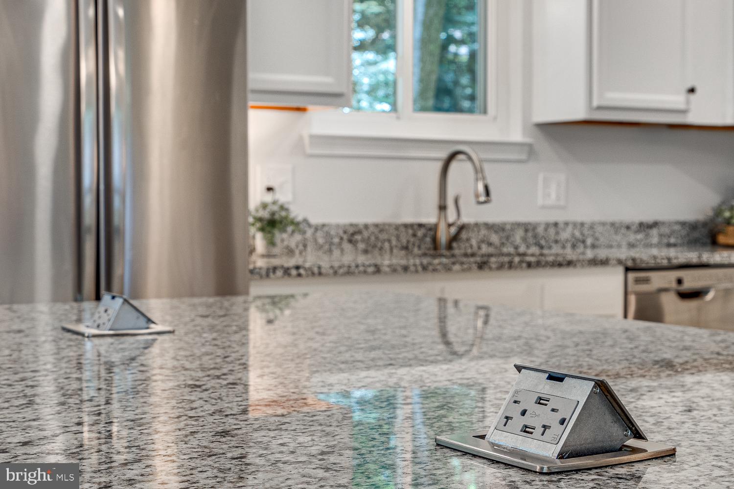 10197 Wavell Road Fairfax, VA 22032 - Photo 18 of 47 a kitchen with sink a window and cabinets