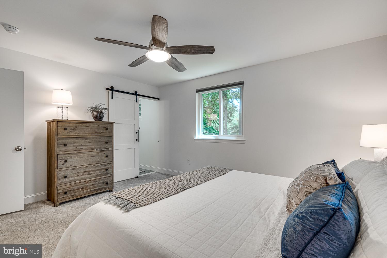 10197 Wavell Road Fairfax, VA 22032 - Photo 20 of 47 a bedroom with a bed and a window