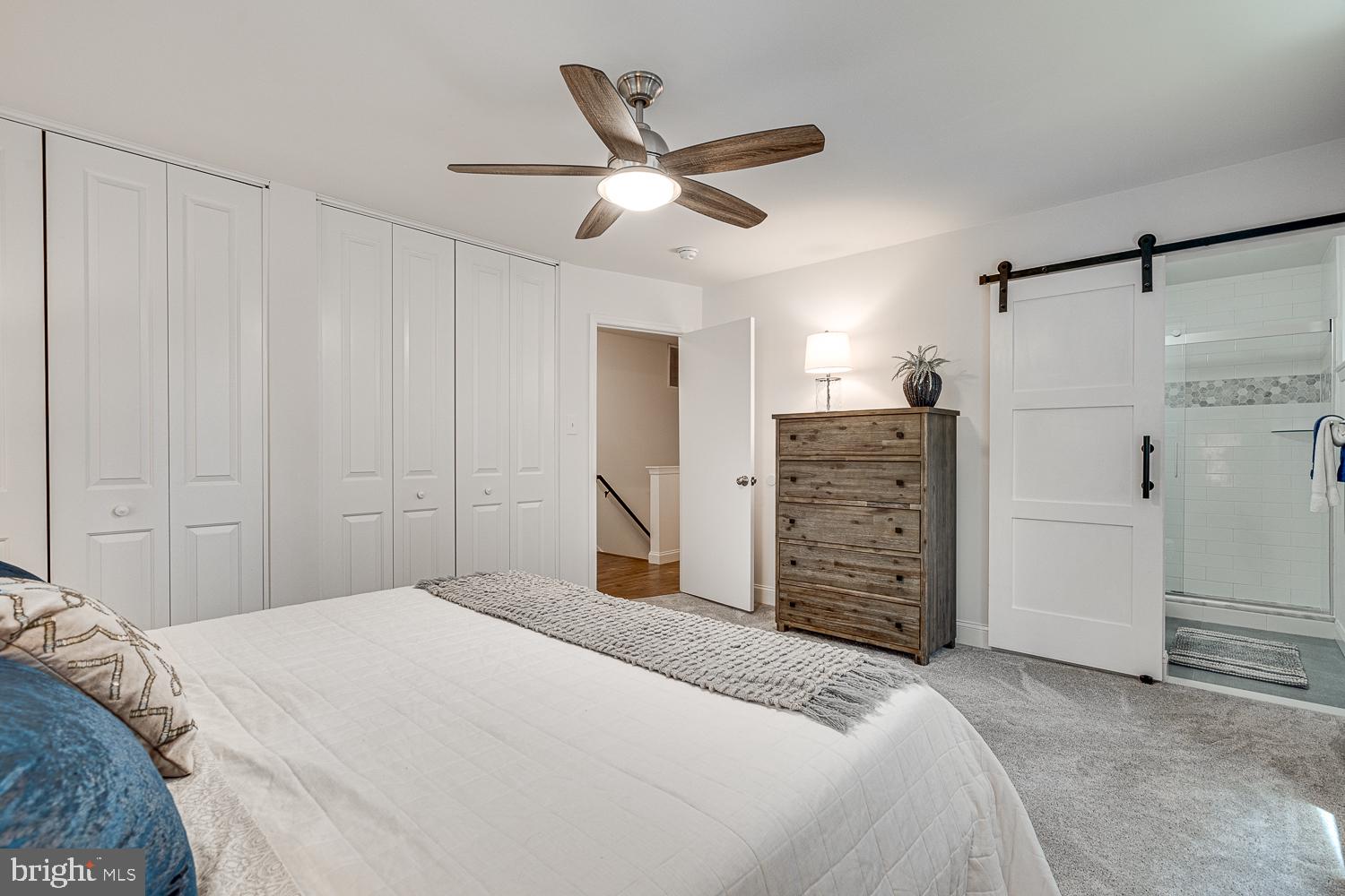 10197 Wavell Road Fairfax, VA 22032 - Photo 21 of 47 a bedroom with a large bed and a closet