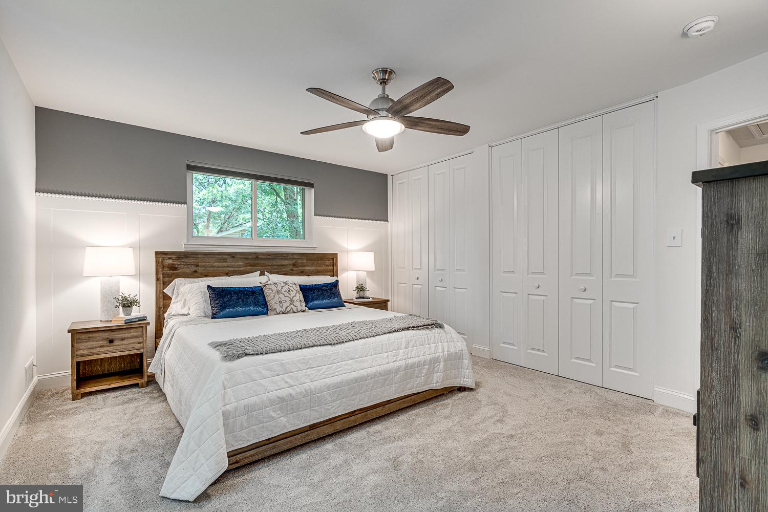10197 Wavell Road Fairfax, VA 22032 - Photo 22 of 47 a bedroom with a bed and a chandelier