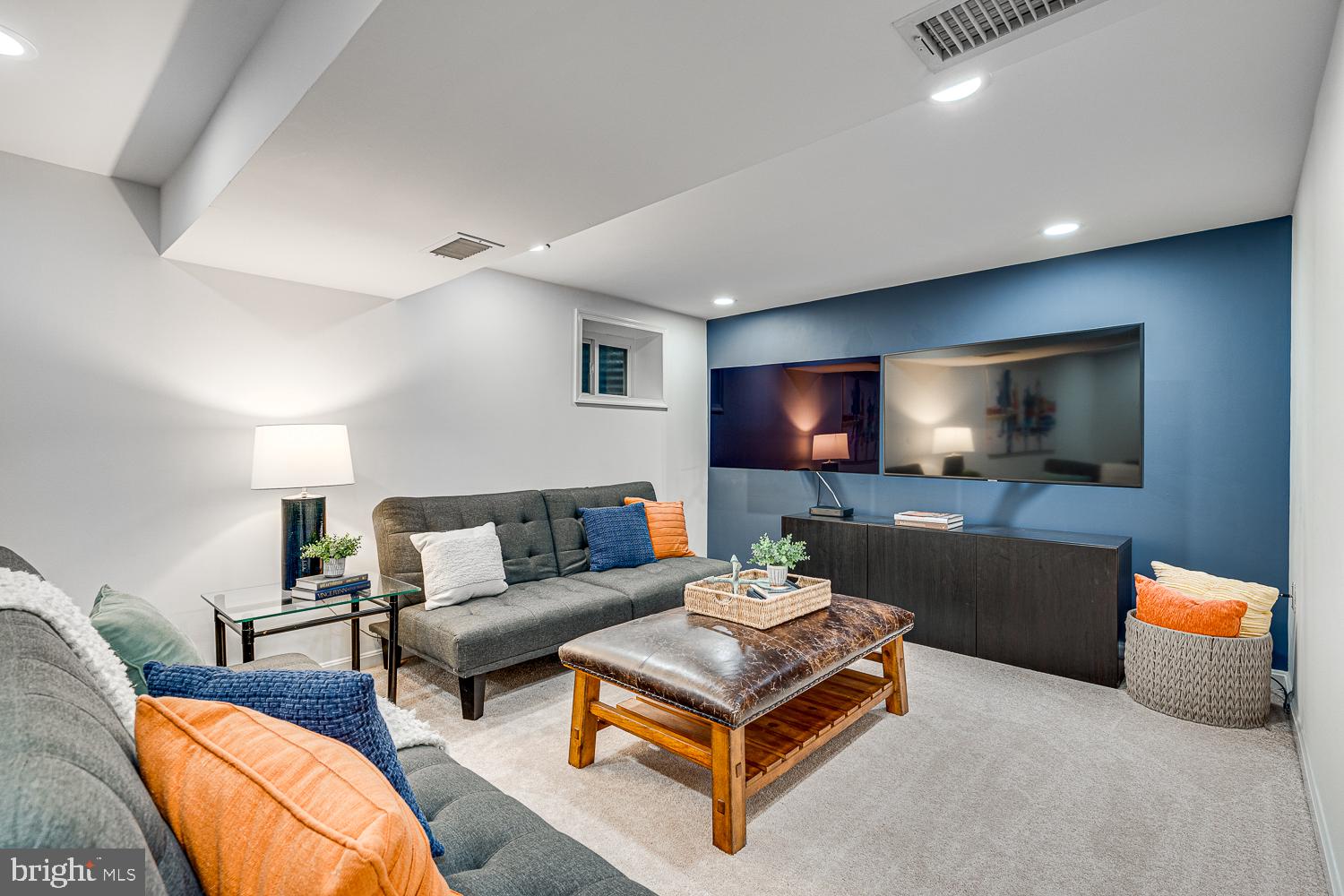 10197 Wavell Road Fairfax, VA 22032 - Photo 35 of 47 a living room with furniture and a flat screen tv