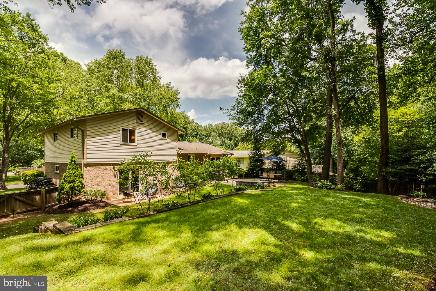 10197 Wavell Road Fairfax, VA 22032 - Photo 44 of 47 a view of a house with a yard