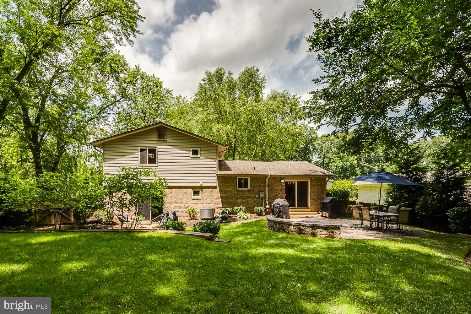 10197 Wavell Road Fairfax, VA 22032 - Photo 45 of 47 a front view of house with yard patio and green space