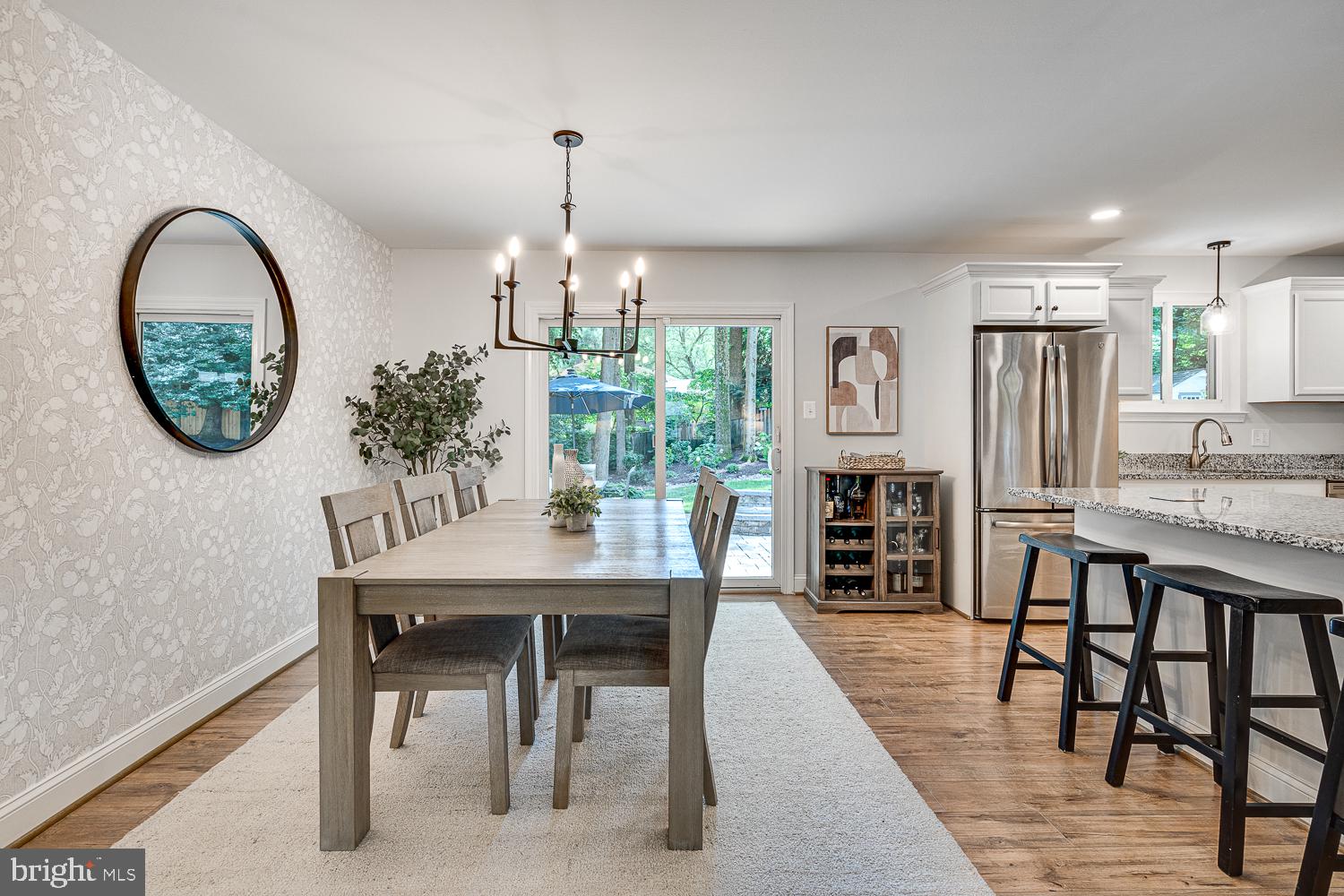 10197 Wavell Road Fairfax, VA 22032 - Photo 10 of 47 a view of a dining room with furniture window and wooden floor