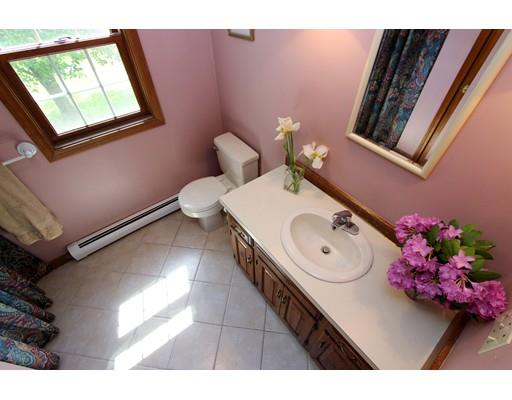 8 Knoll Top Road Sandwich, MA 02644 - Photo 16 of 25 a bathroom with a sink mirror and vanity