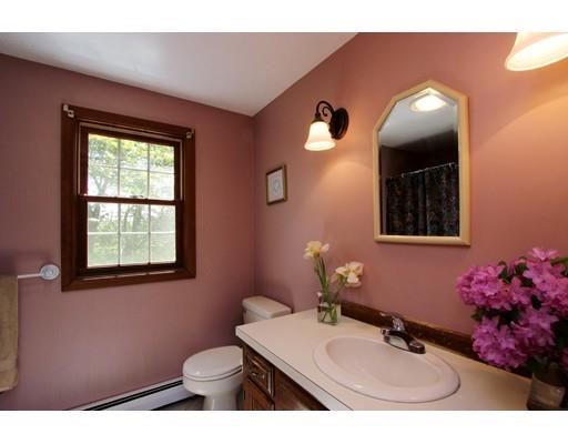 8 Knoll Top Road Sandwich, MA 02644 - Photo 17 of 25 a bathroom with a sink mirror and vanity