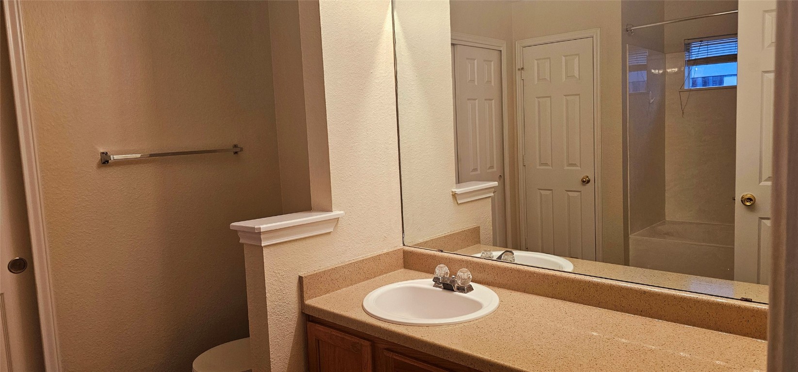 1840 Wallin Loop Round Rock, TX 78664 - Photo 13 of 17 a bathroom with a sink and a mirror