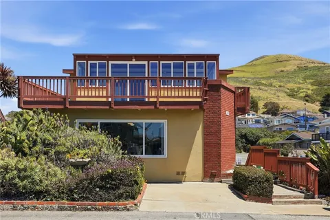 a front view of a house with balcony