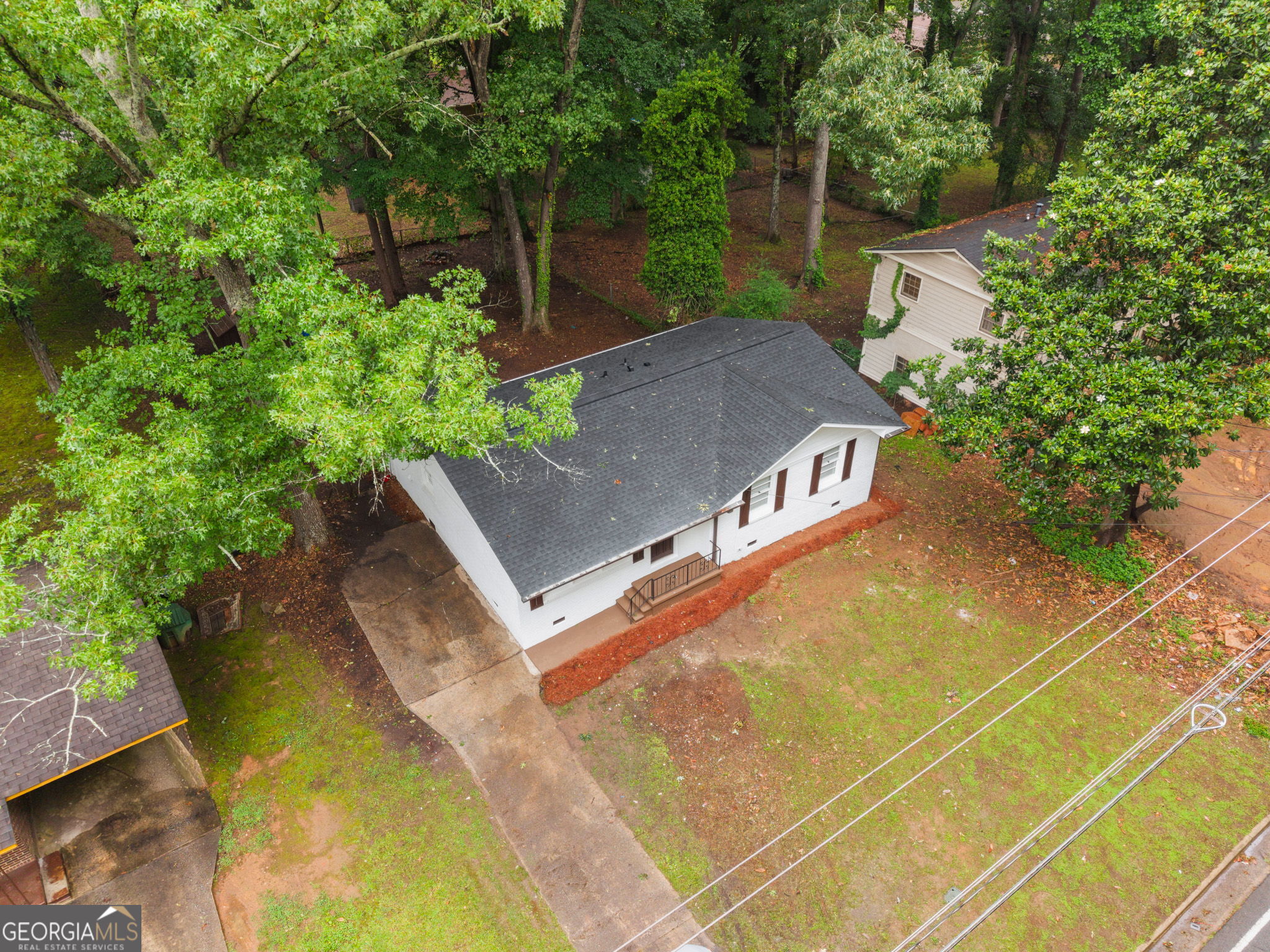 3567 Forrest Park Road Southeast Atlanta, GA 30354 - Photo 27 of 29 a view of a swimming pool with a patio