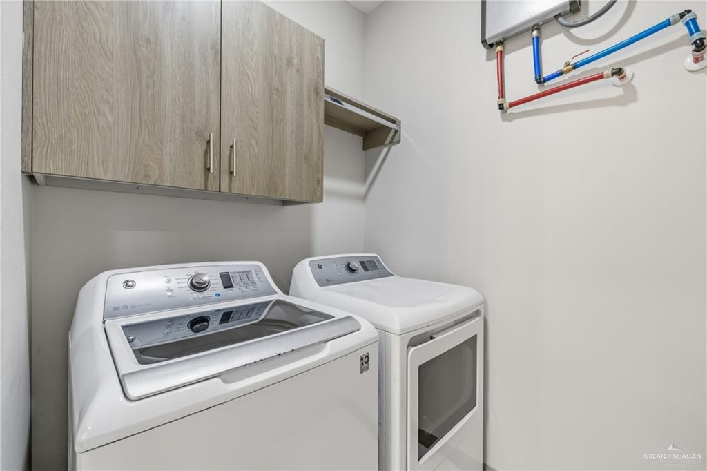 3302 South Sugar Road, Unit H Edinburg, TX 78539 - Photo 12 of 24 a utility room with dryer and washer