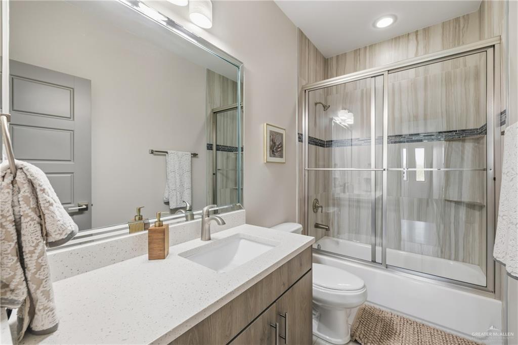 3302 South Sugar Road, Unit H Edinburg, TX 78539 - Photo 13 of 24 a bathroom with a sink toilet and shower