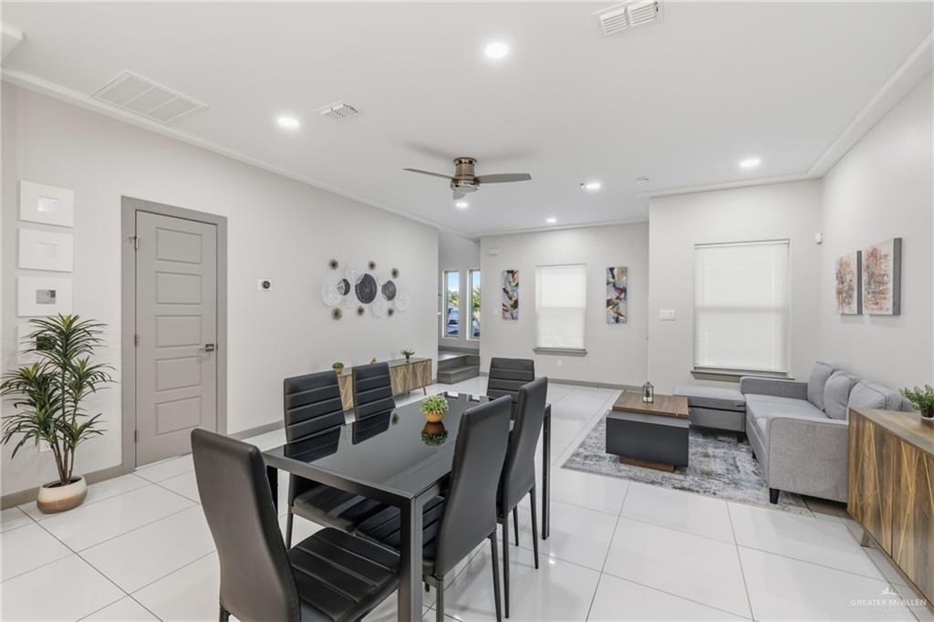3302 South Sugar Road, Unit H Edinburg, TX 78539 - Photo 6 of 24 a view of a dining room with furniture
