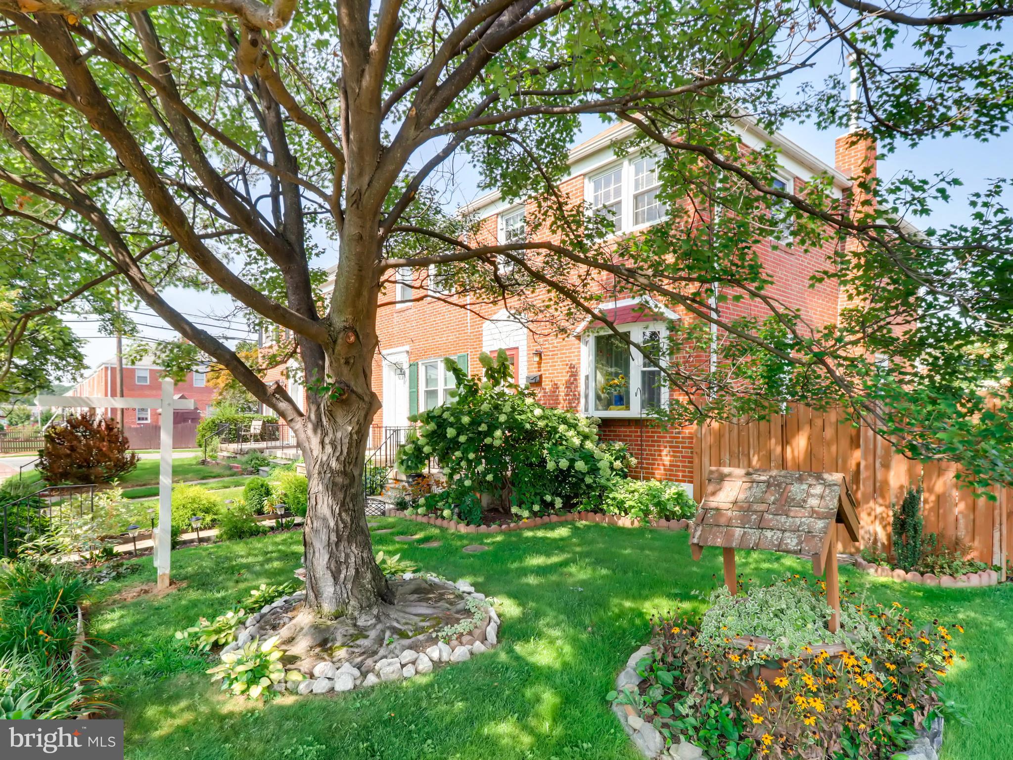 2207 Graythorn Road Baltimore, MD 21220 - Photo 1 of 30 a backyard of a house with lots of green space