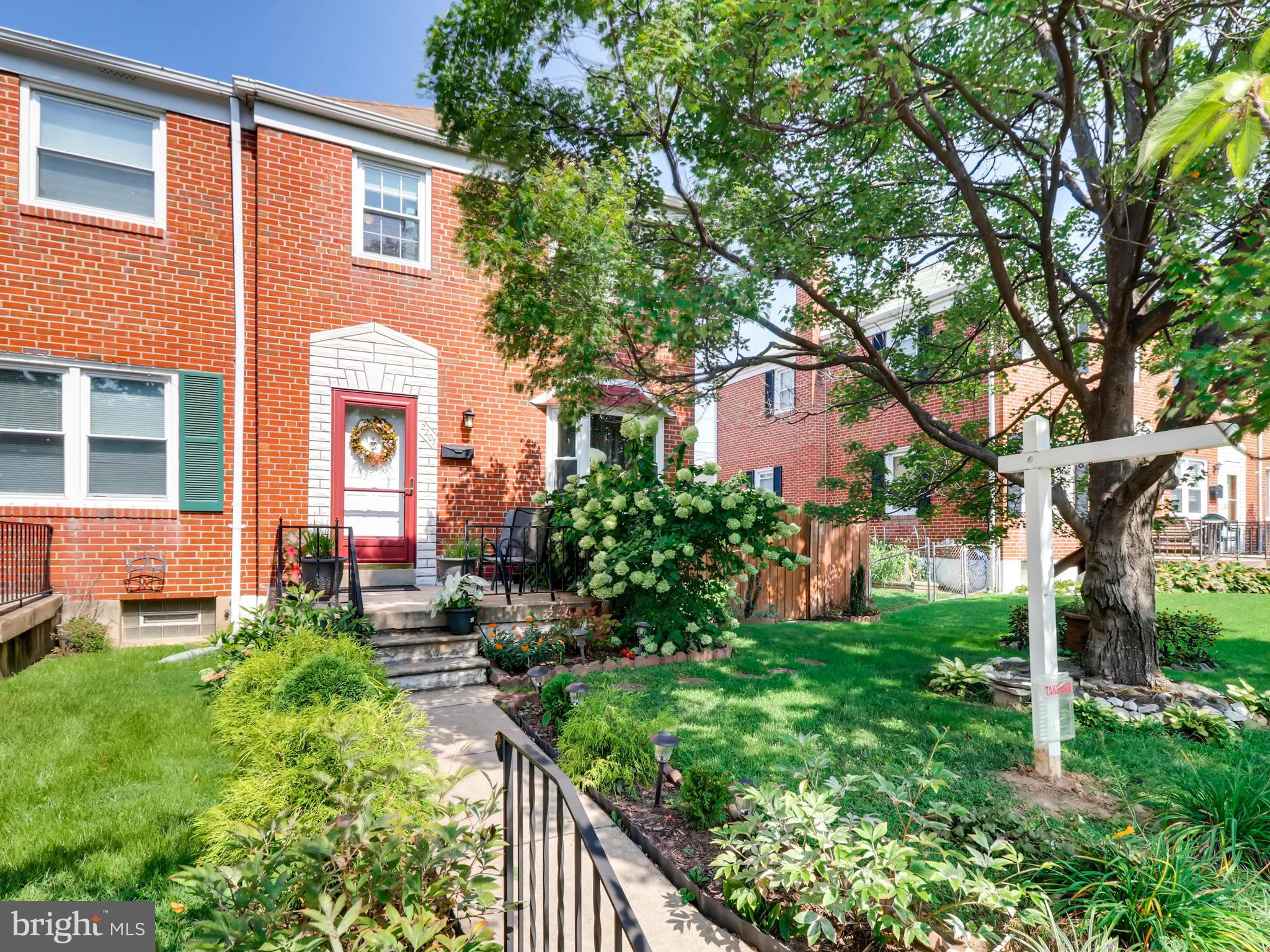 2207 Graythorn Road Baltimore, MD 21220 - Photo 2 of 30 a front view of a house with garden