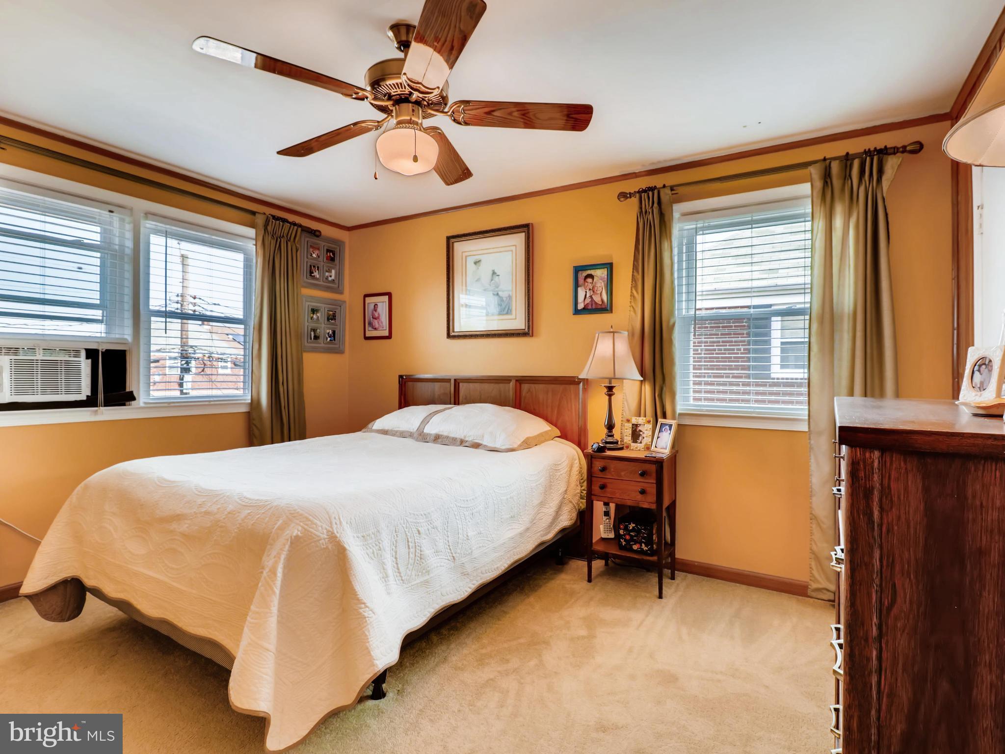 2207 Graythorn Road Baltimore, MD 21220 - Photo 15 of 30 a bedroom with a bed dresser and a window