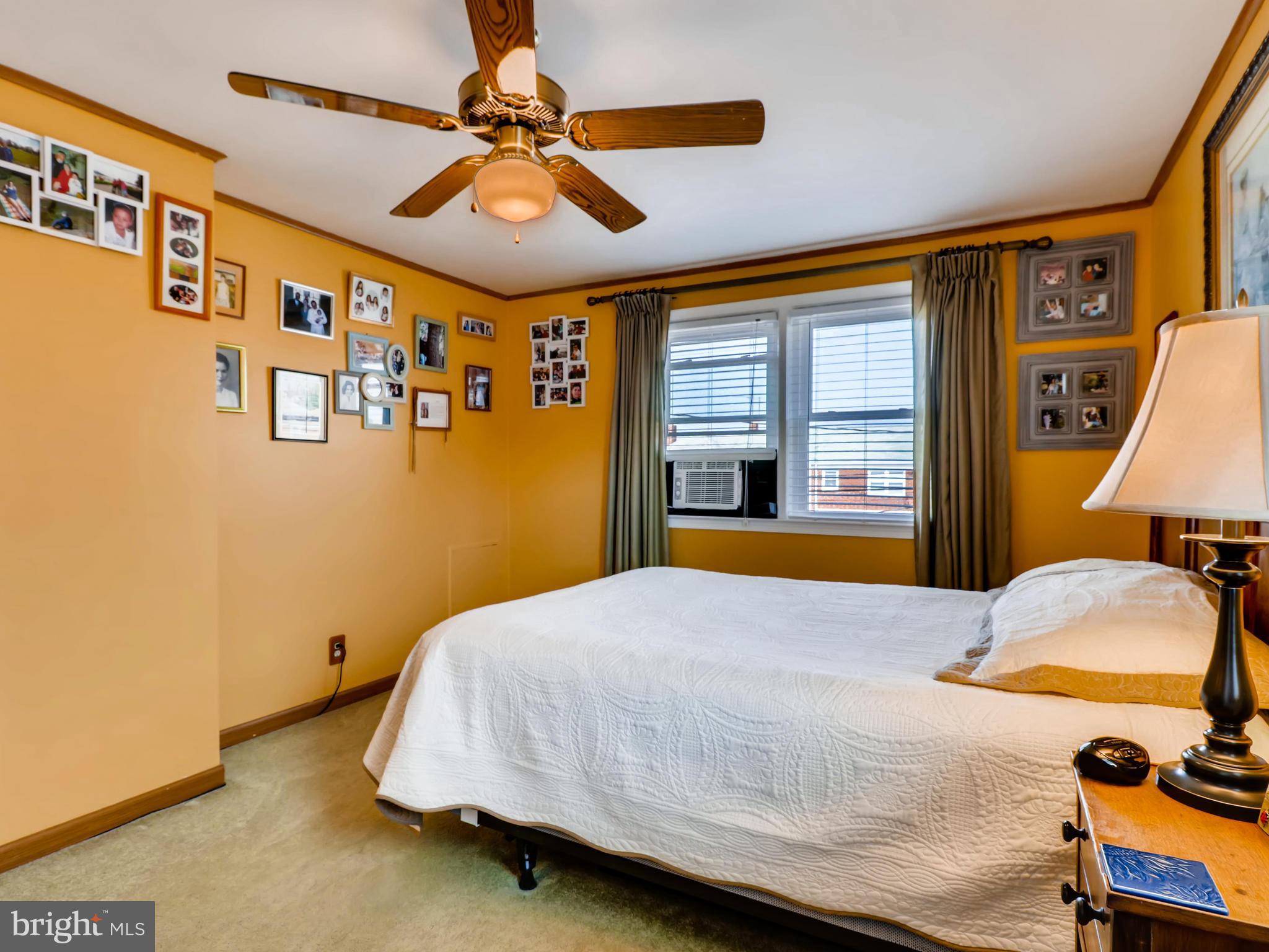 2207 Graythorn Road Baltimore, MD 21220 - Photo 16 of 30 a bedroom with a bed and a window