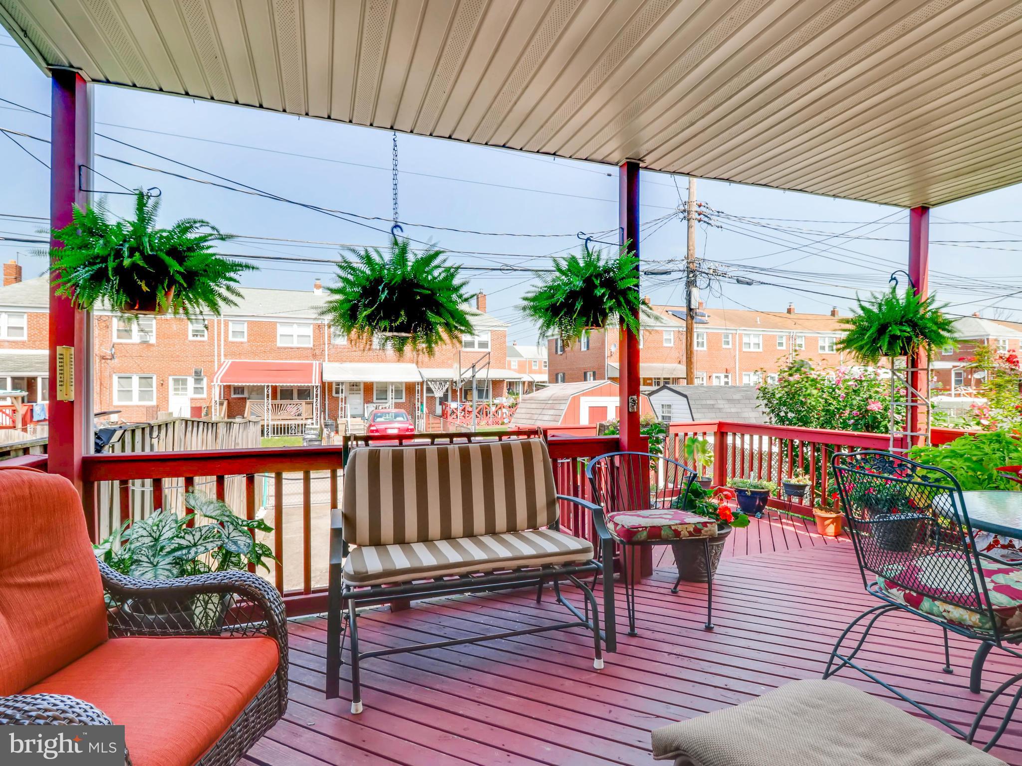 2207 Graythorn Road Baltimore, MD 21220 - Photo 3 of 30 a view of a chairs on the deck