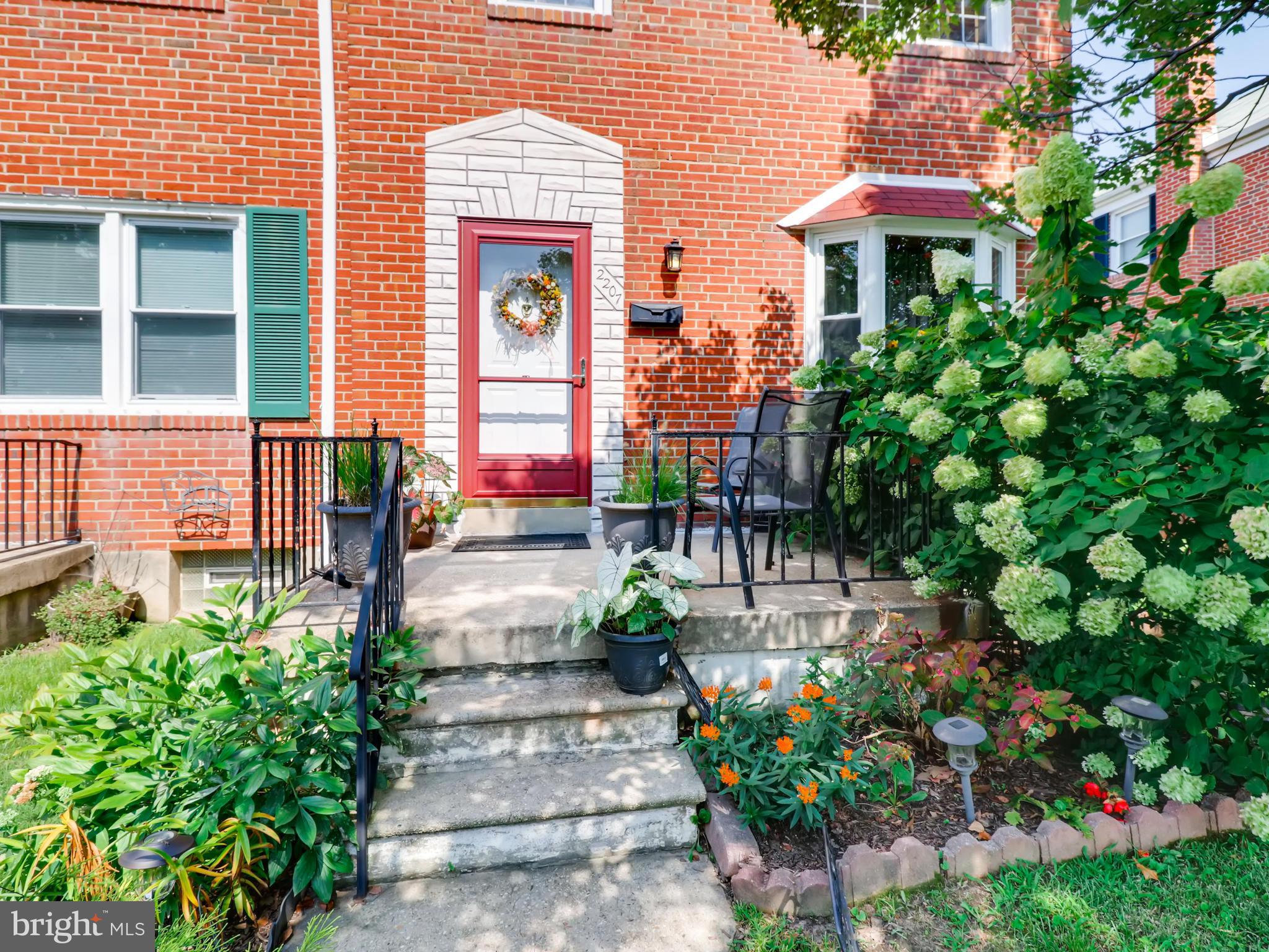 2207 Graythorn Road Baltimore, MD 21220 - Photo 30 of 30 a front view of a house with garden