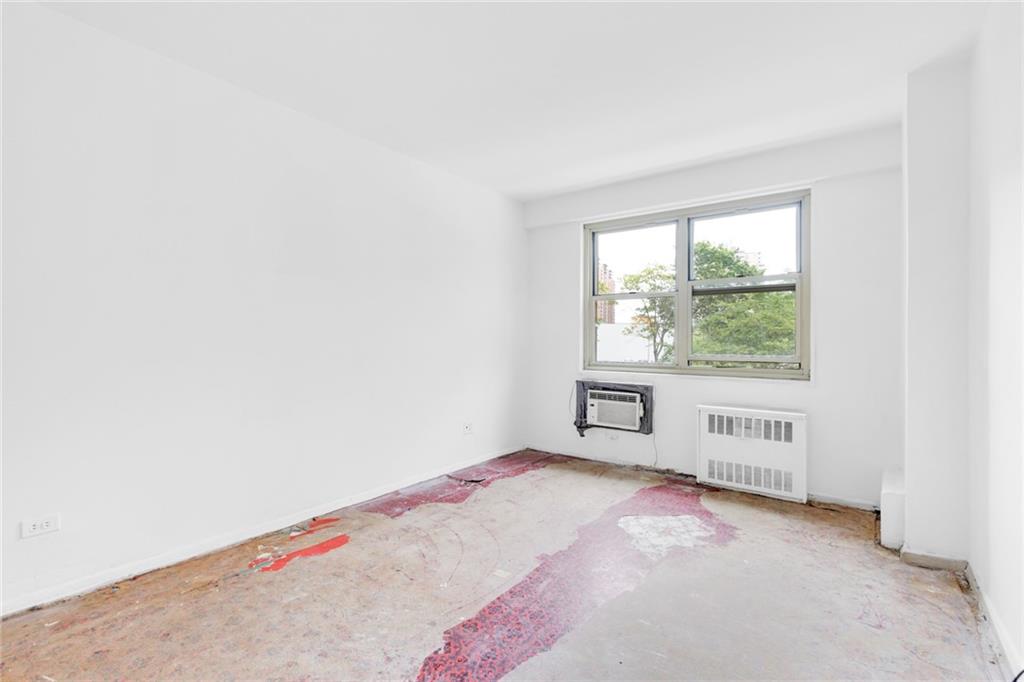 2930 West 5th Street, Unit 2C Brooklyn, NY 11224 - Photo 13 of 21 an empty room with windows