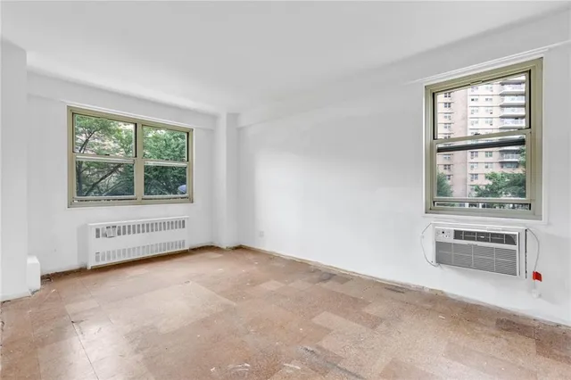 an empty room with windows