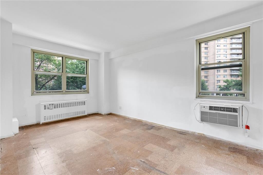 2930 West 5th Street, Unit 2C Brooklyn, NY 11224 - Photo 14 of 21 an empty room with windows