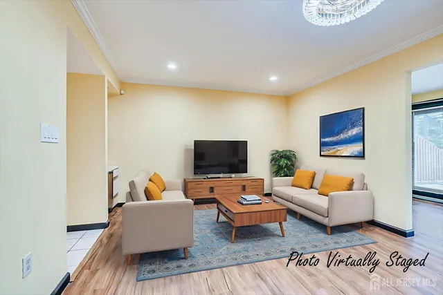 a kitchen with stainless steel appliances kitchen island granite countertop a sink and cabinets