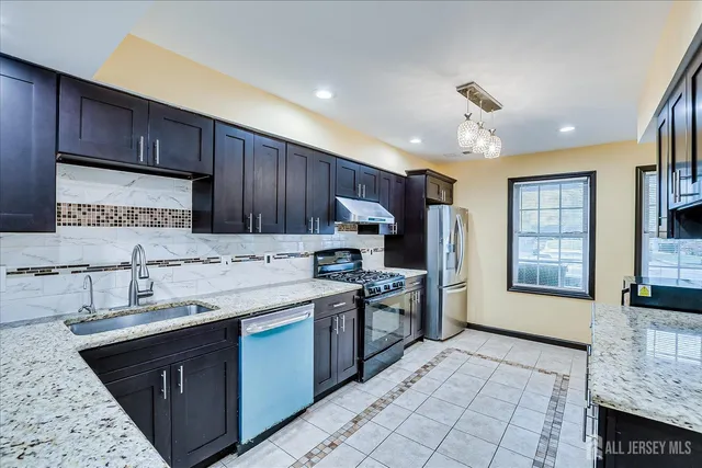 a bedroom with a large bed and a large window with outer view