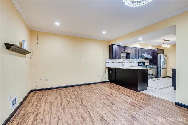 a view of a livingroom with a ceiling fan