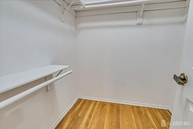 a bathroom with a sink toilet and mirror