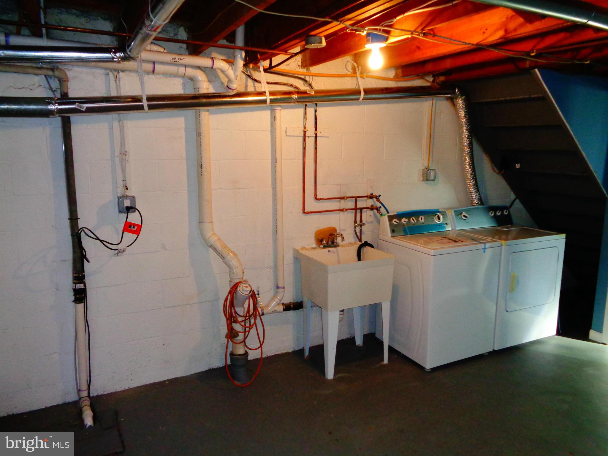 2109 Hawthorne Road Baltimore, MD 21220 - Photo 22 of 28 a utility room with dryer and washer