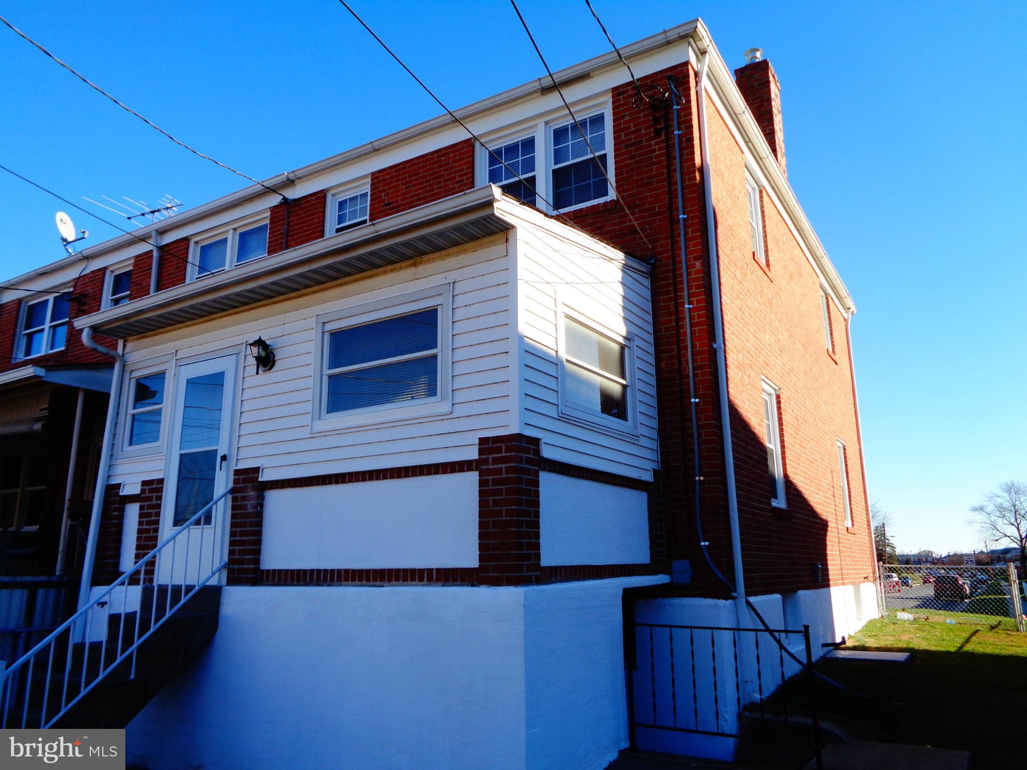 2109 Hawthorne Road Baltimore, MD 21220 - Photo 23 of 28 a view of a house with a street view