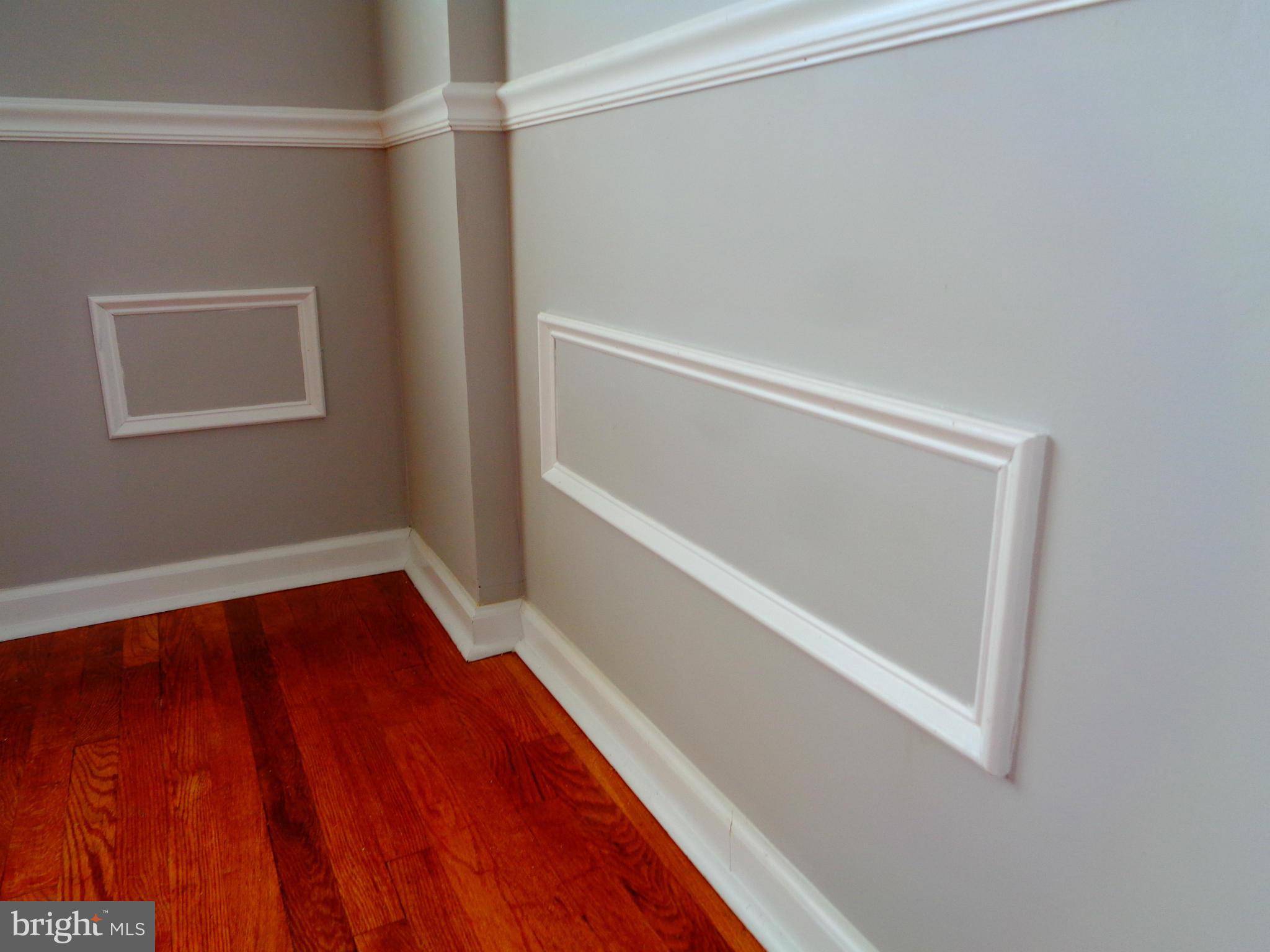 2109 Hawthorne Road Baltimore, MD 21220 - Photo 10 of 28 a view of an empty room with wooden floor