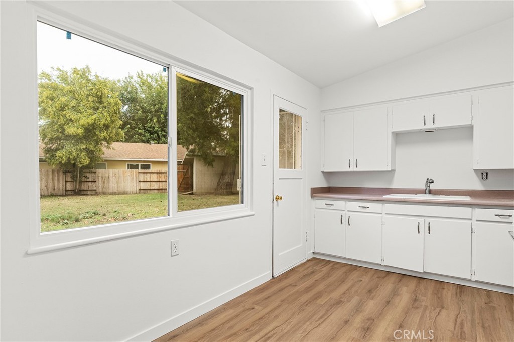 2344 Porter Way Chico, CA 95926 - Photo 15 of 35 a kitchen with a sink and large window