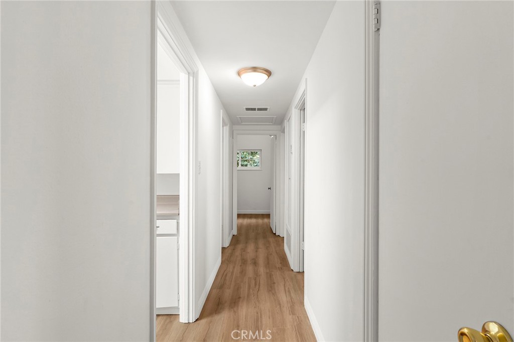 2344 Porter Way Chico, CA 95926 - Photo 19 of 35 a view of a hallway with wooden floor