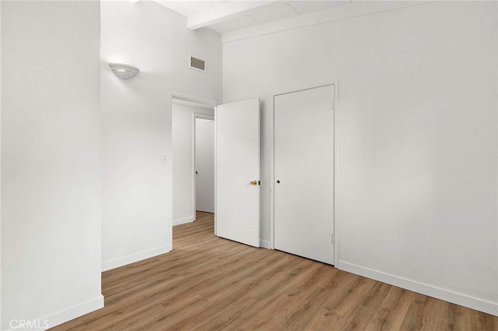 2344 Porter Way Chico, CA 95926 - Photo 26 of 35 a view of an empty room with wooden floor