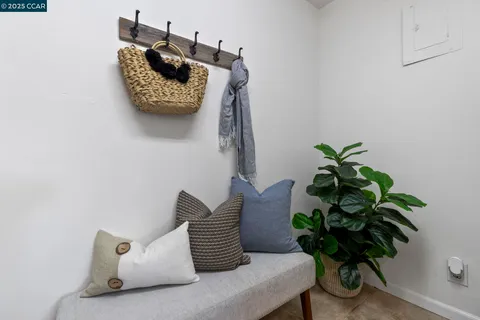 a bathroom with double vanity sinks and a mirror