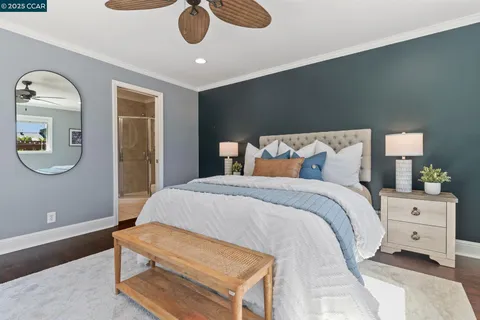a bathroom with a sink vanity granite and toilet