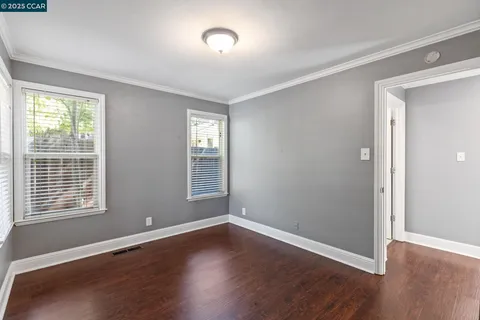 a view of a chairs and table in backyard